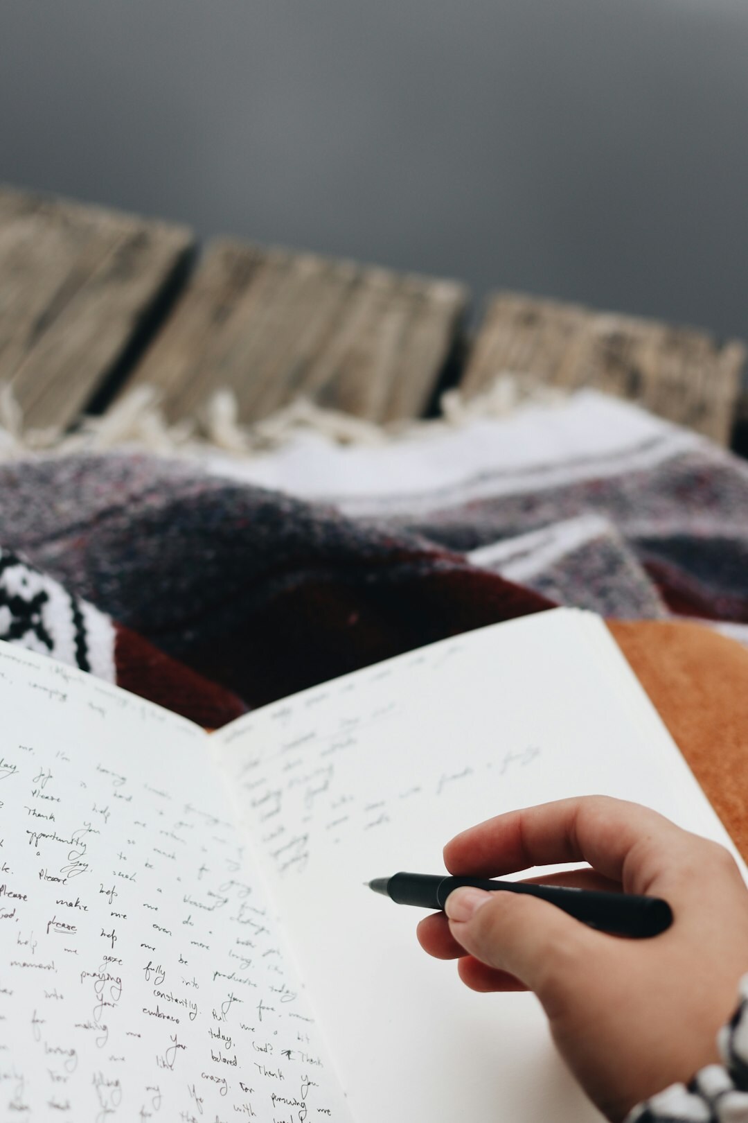 person journaling thoughts