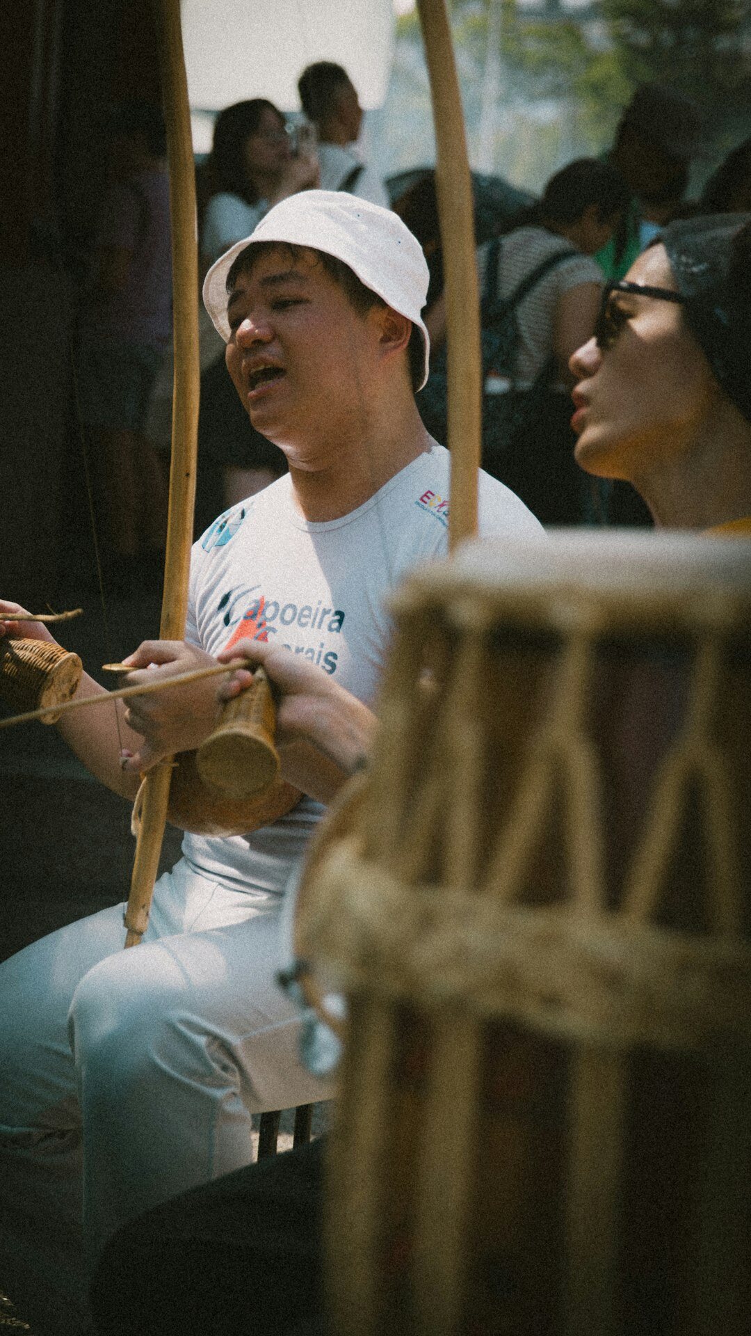 Diverse group of Brazilian adults sitting in a circle during a personal development workshop